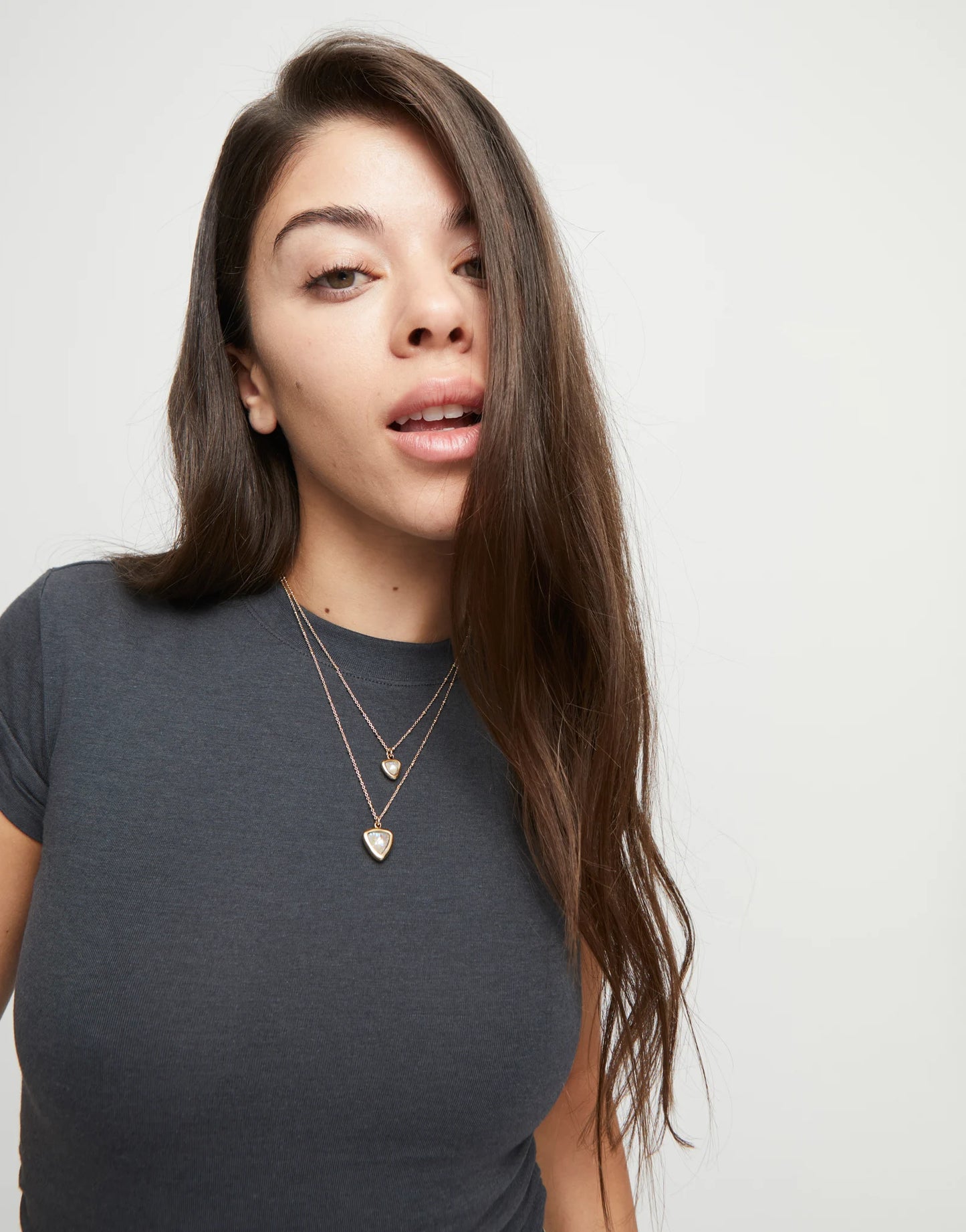 18k gold plated metal alloy necklace with double chain and white crystal triangle