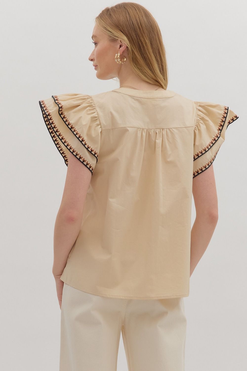 Solid layered ruffle flutter sleeve top