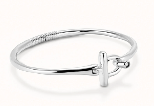 rigid bracelet with front closure of metal alloy plated in sterling silver with white topaz M