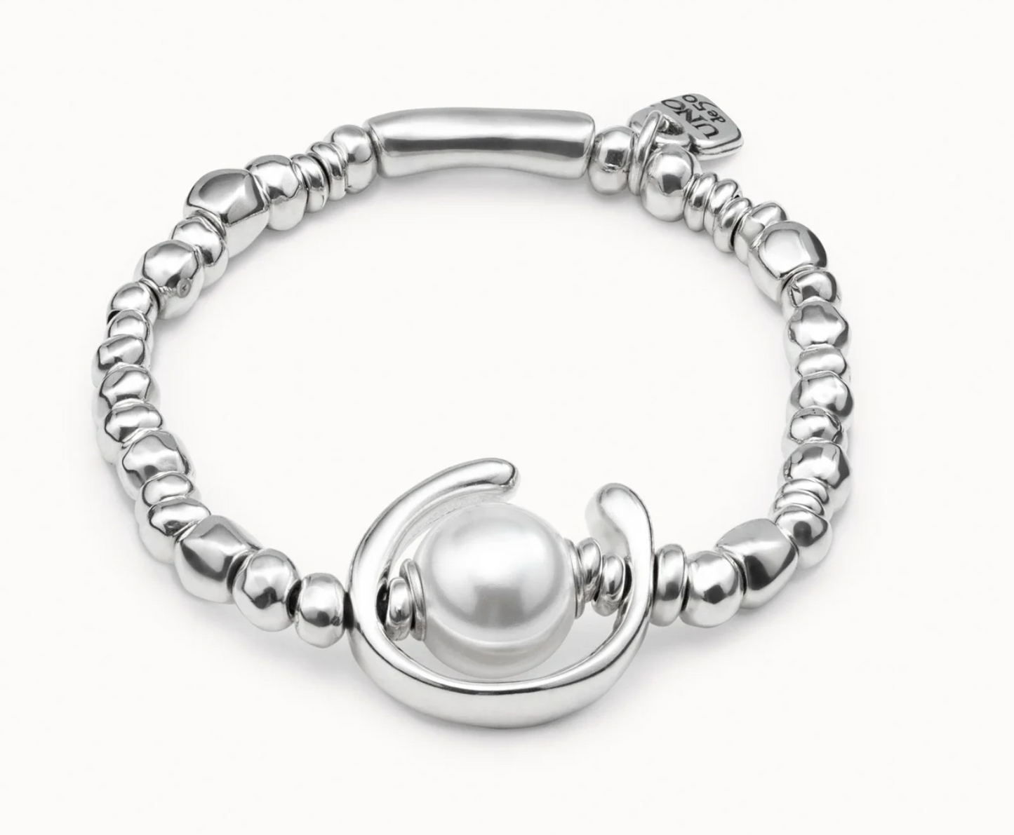 metal bracelet clad with sterling silver with pearl.