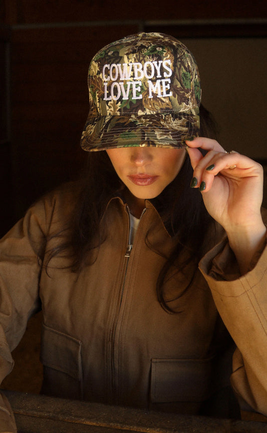 COWBOYS LOVE ME TRUCKER HAT
