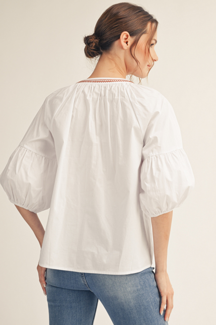 PUFF SLEEVE TOP WITH FLORAL DETAIL